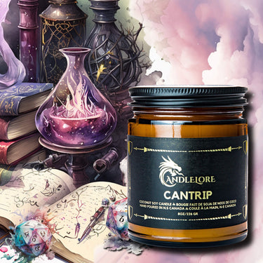 candle with books and spell components around it